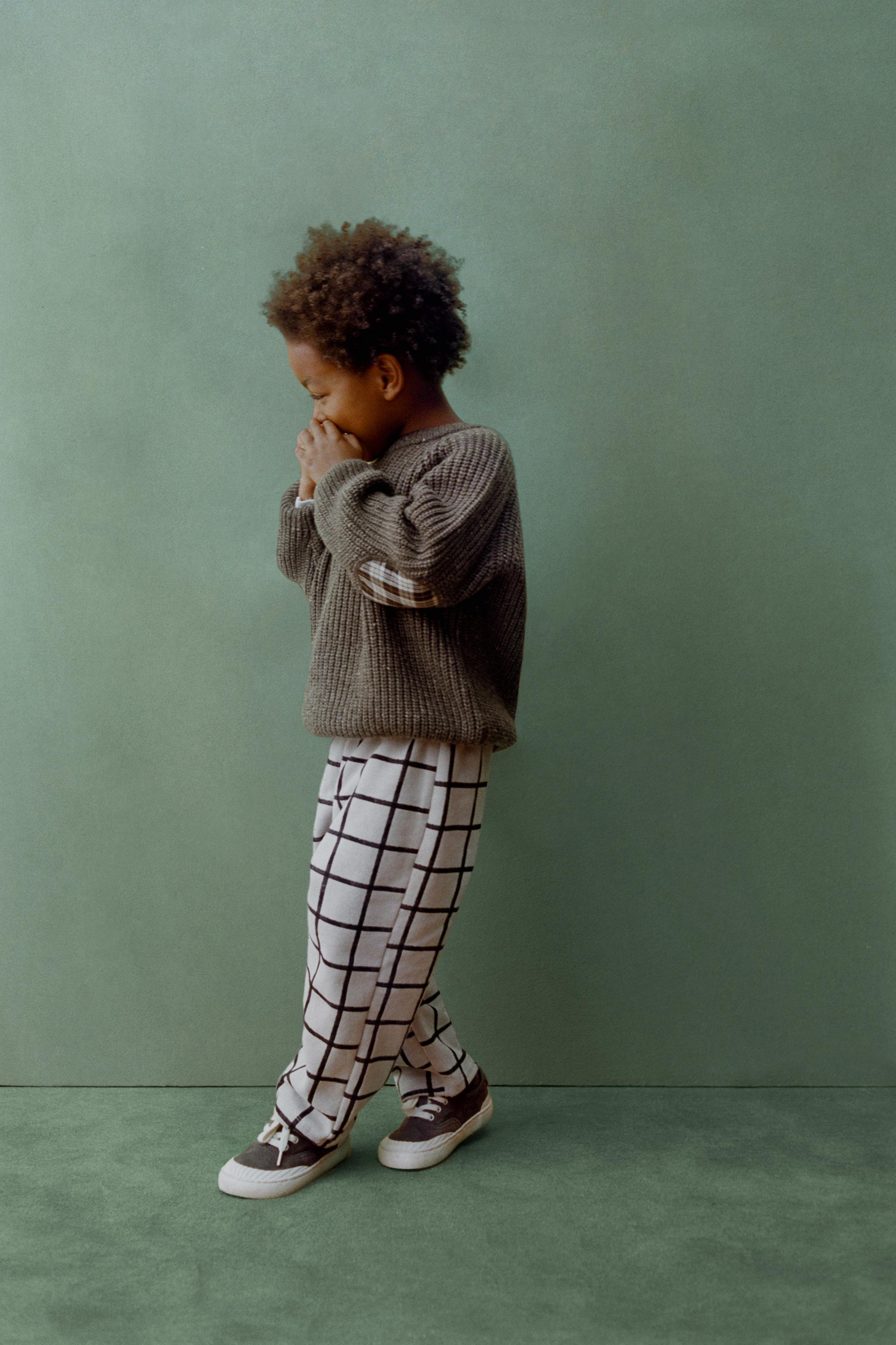 PANTALON BAGGY EN MOLLETON À CARREAUX